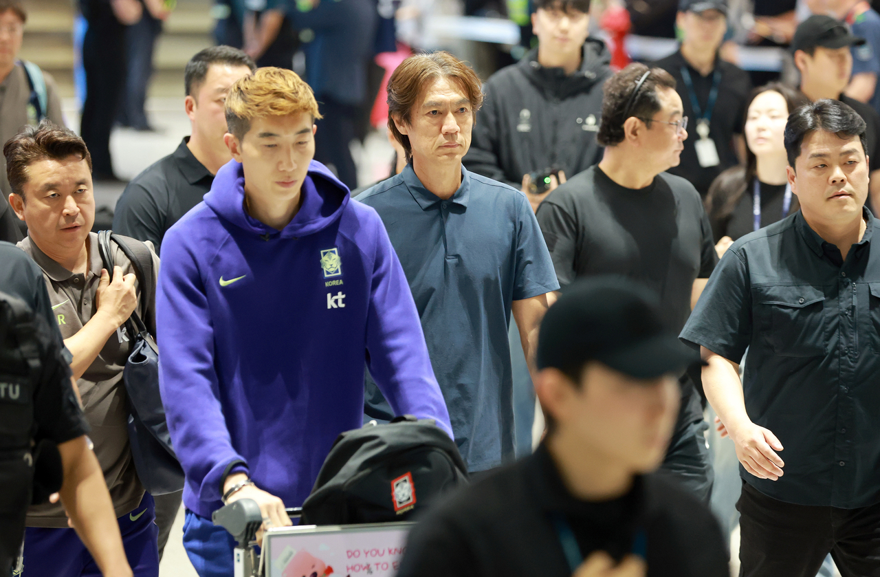 Former South Korea head coach Hong Myung-bo arrives at Incheon Airport Terminal 2 on June 30 after the national team's campaign at the 2026 FIFA World Cup in North America. (Lim Se-jun/The Korea Herald)