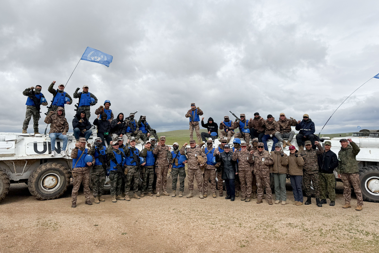 This file photo, provided by the Marine Corps, shows participating nations posing after completing a convoy mission during the Khaan Quest exercise, which ran from June 20 to July 3 near Ulaanbaatar, Mongolia, on June 21. (Yonhap)