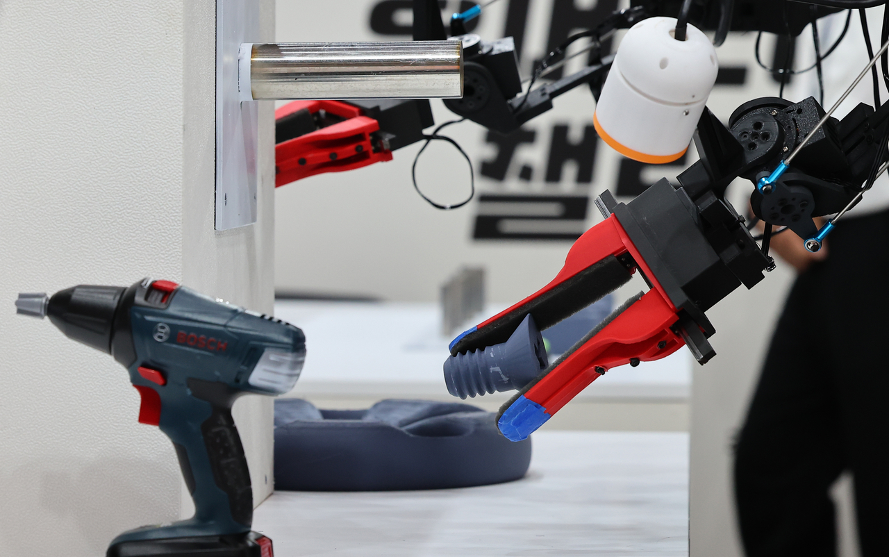A robot performs tasks in the industrial automation league at RoboCup 2026 Incheon on Thursday. (Yonhap)