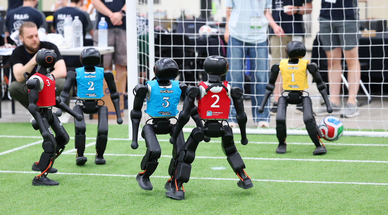 A robot scores a goal during the soccer match at the RoboCup 2026 Incheon on Thursday. (Yonhap)