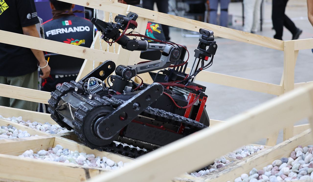 A rescue robot performs tasks in the rescue league at RoboCup 2026 Incheon on Thursday. (Yonhap)