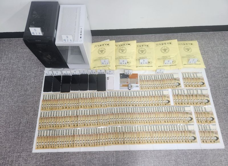 Items seized from an overseas-based illegal online gambling ring are displayed by the Gangwon Provincial Police Agency. (Gangwon Provincial Police Agency)