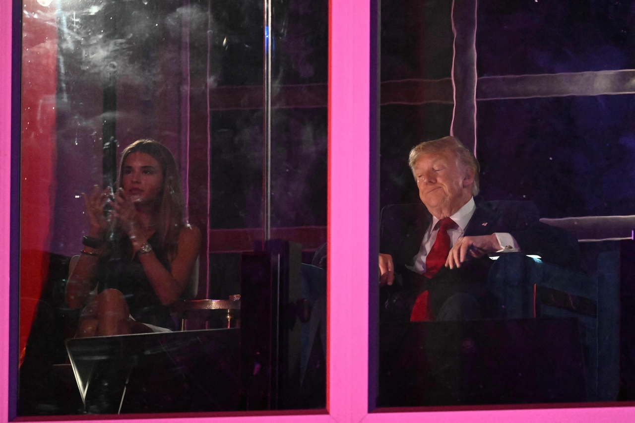 Kai Trump and US President Donald Trump watch the fireworks display during the "Salute to America" Independence Day celebration on the National Mall in Washington, DC, in the early morning hours of July 5, 2026. (AFP-Yonhap)