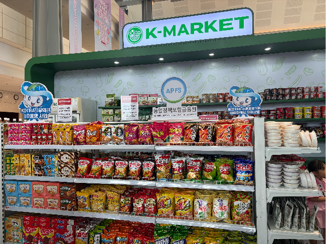 Korean snacks and food products are displayed at the K-Market booth during the Korea Brand and Entertainment Expo in Hanoi, Vietnam, Friday. (Ahn Sung-mi/The Korea Herald)