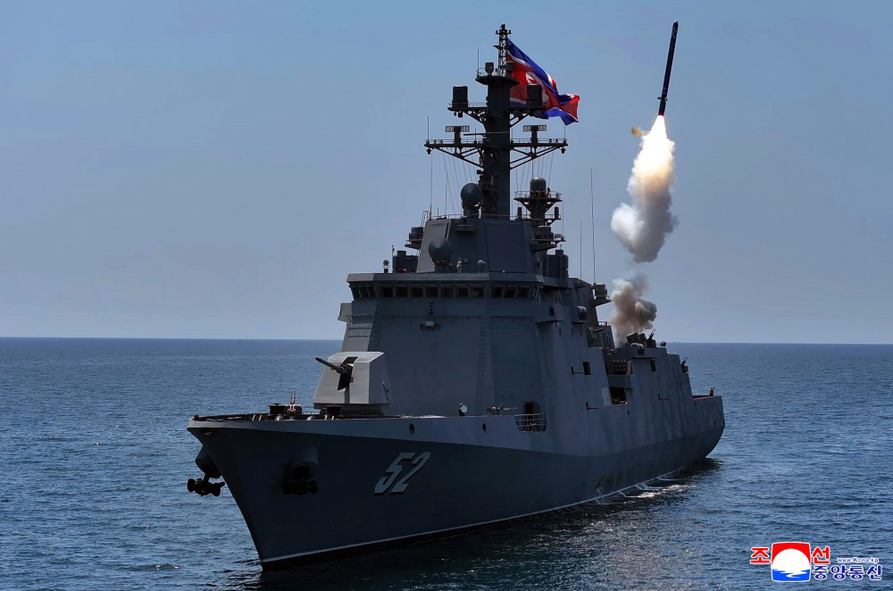 North Korea conducts tests of a cruise missile and other weapons from the destroyer Kang Kon on Friday. (KCNA via Yonhap)