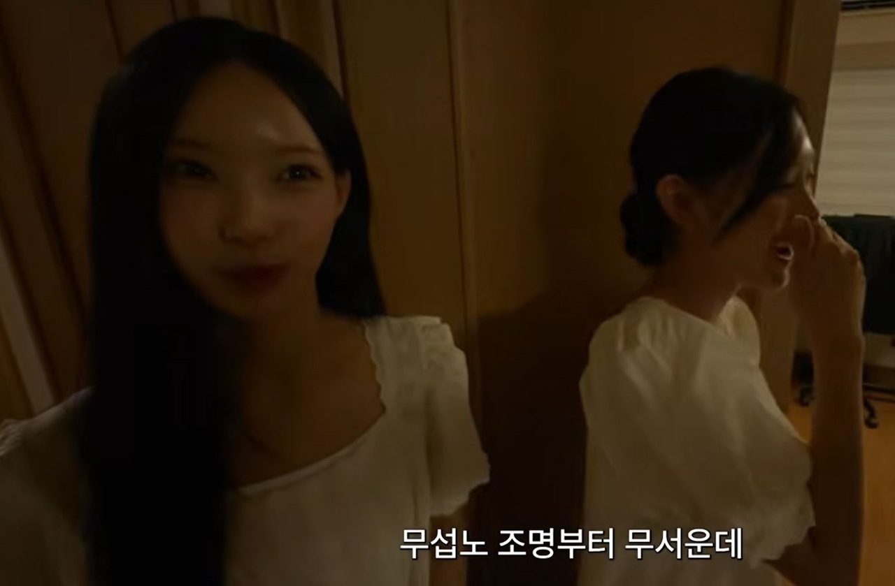 Woni (left) of Rescene appears in a video posted to her official YouTube channel on June 28. The text overlay reads: “It’s scary. Even the lighting is scary." (YouTube)