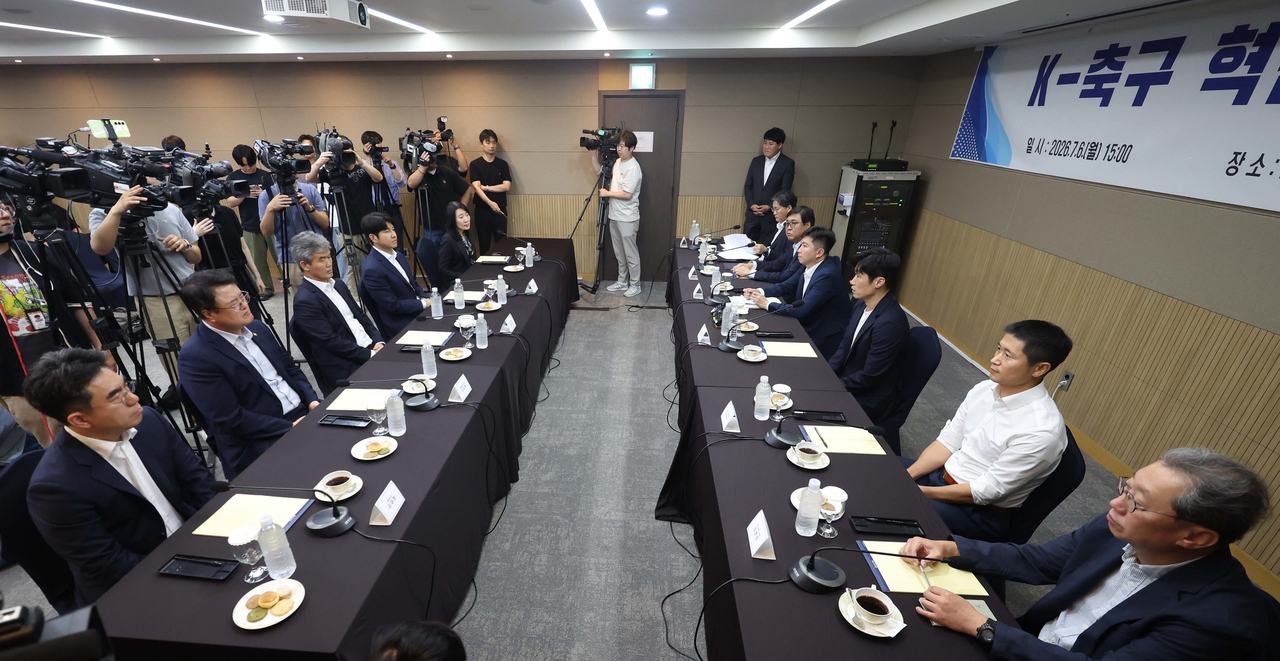 Members of the K-Football Innovation Committee attend the inaugural meeting held in Seoul, Monday. (Yoon Chang-bin/The Korea Herald)