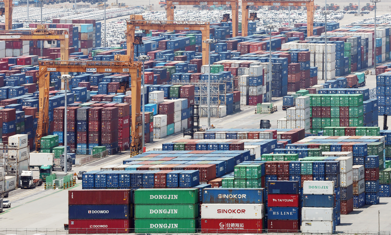 Containers are stacked at a port in Pyeongtaek, south of Seoul, on Wednesday. (Yonhap)