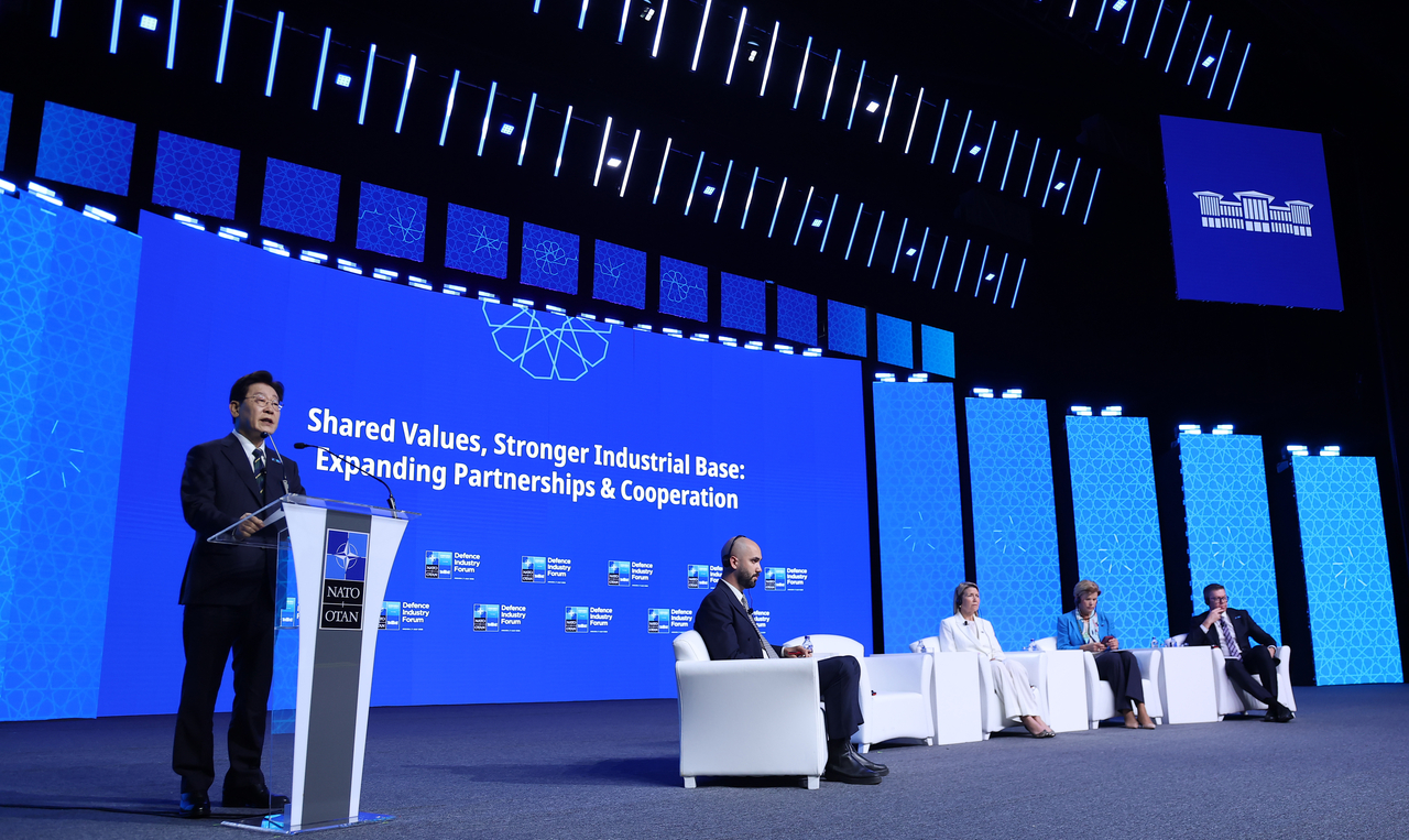 President Lee Jae Myung delivers a keynote speech at the NATO Summit Defense Industry Forum at the Ankara Convention Center in Turkey on Tuesday. (Yonhap)