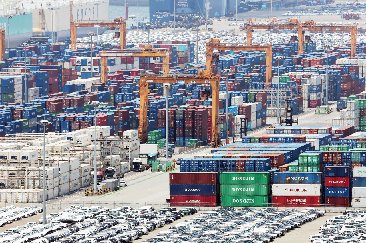 Containers are stacked at a port in Pyeongtaek, south of Seoul, on July 1, 2026. (Yonhap)