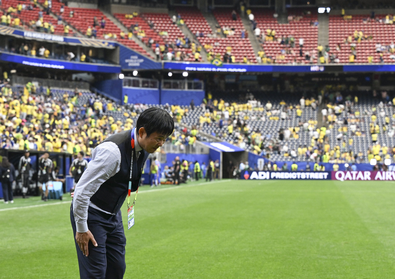Japan head coach Hajime Moriyasu greets the audience after the Round of 32 match between Brazil and Japan at the 2026 FIFA World Cup at Houston Stadium on June 29. Xinhua-Yonhap