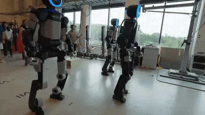Boston Dynamics' humanoid robot Atlas performs the Viking Row, a cheering routine inspired by the World Cup craze. Atlas fluidly executes the consecutive rowing motions, showcasing Hyundai Motor Group's robotics capabilities. [YouTube screenshot]