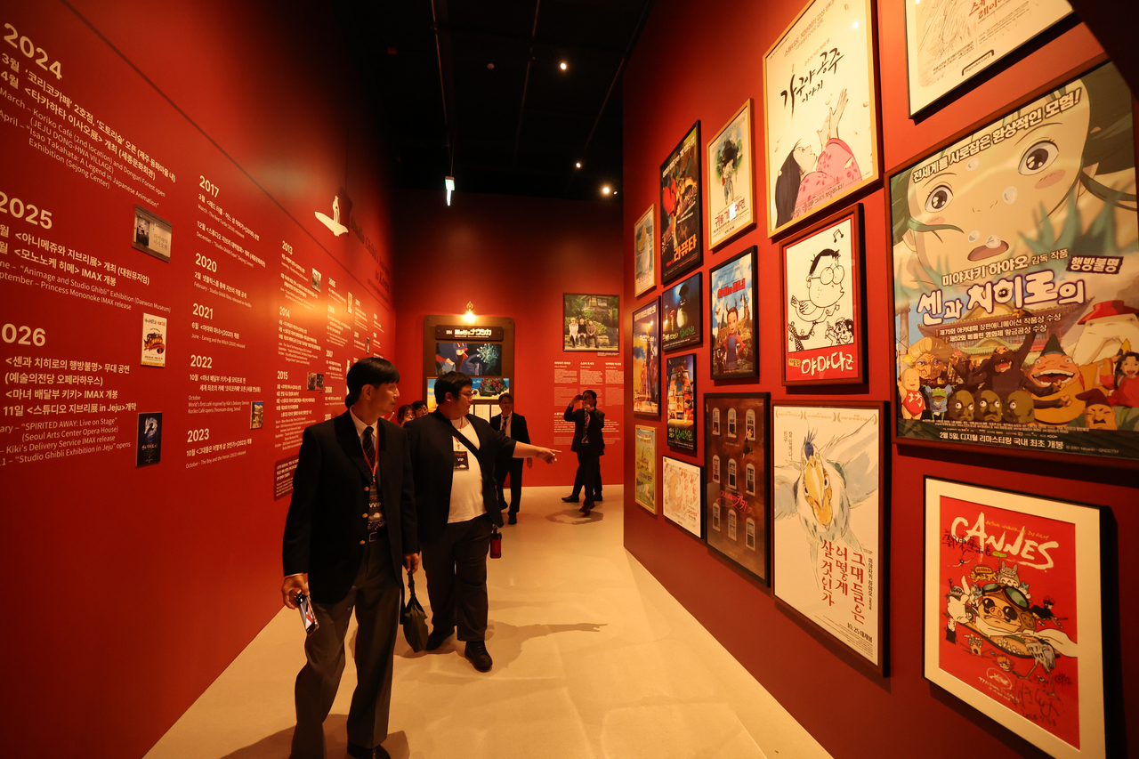 Visitors explore the Studio Ghibli Exhibition in Jeju on Saturday. (Yonhap)