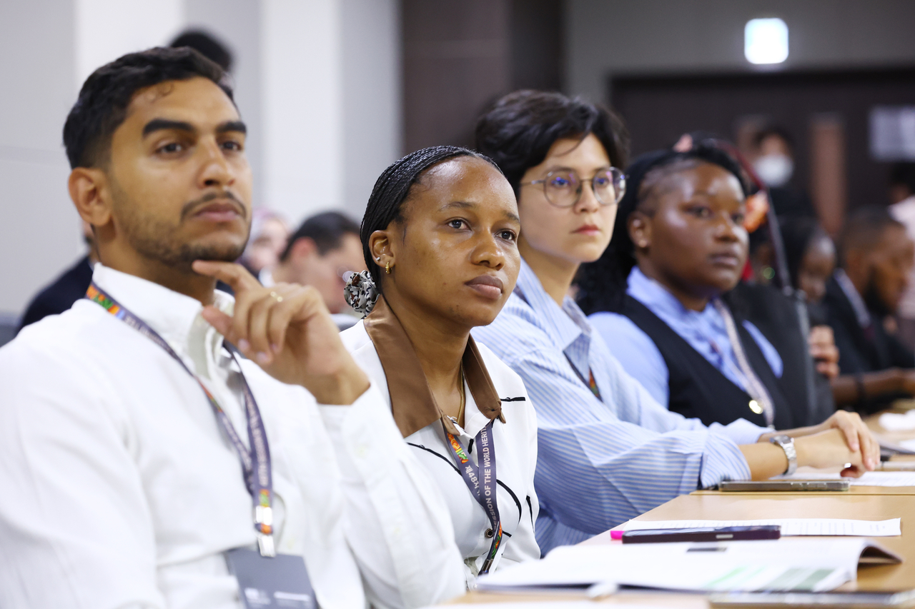 Young professionals attend the opening ceremony of the 2026 World Heritage Young Professionals Forum at the National Palace Museum of Korea in Seoul on Monday. (Yonhap)