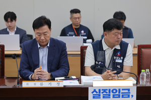 Labor, management narrow gap in minimum wage proposals to 200 won