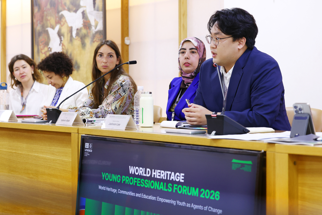 Lee Jae-hoon (first from right), a participant in the 2026 World Heritage Young Professionals Forum, answers a question during a media interview at the National Palace Museum of Korea in Seoul on Monday. (Yonhap)