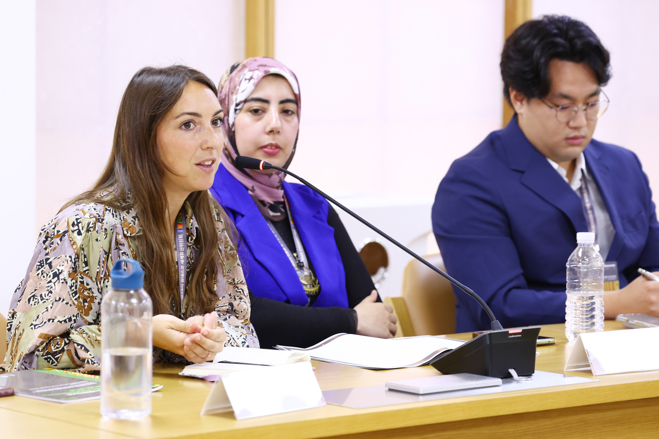 Angela Puppini of Italy (first from left), a participant in the 2026 World Heritage Young Professionals Forum, answers a question during a media interview at the National Palace Museum of Korea in Seoul on Monday. (Yonhap)