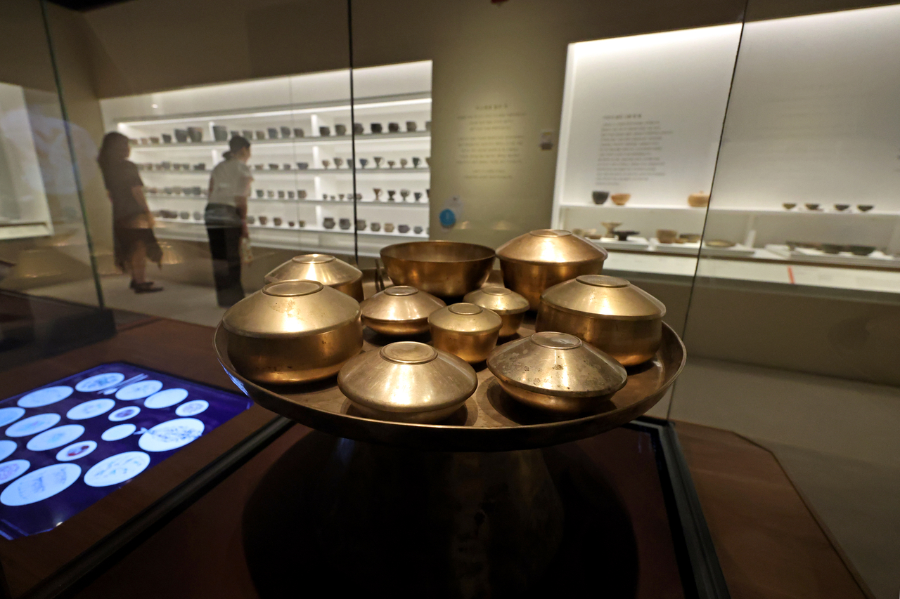 Brass tableware is displayed at the "The Korean Table: Food, Nature, and Life" exhibition at the National Museum of Korea in Seoul on June 30. (Newsis)