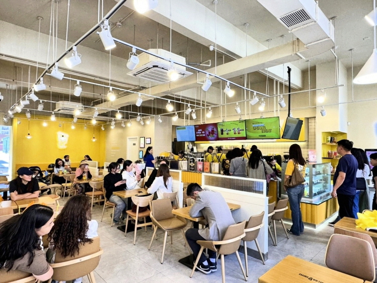 Customers line up to order at a Mega Coffee store in Ulaanbaatar. (Mega MGC Coffee)