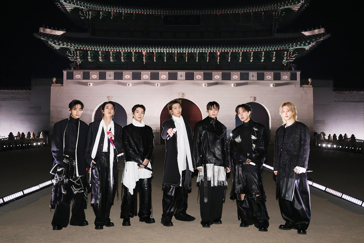 BTS poses in front of Gwanghwamun ahead of "BTS The Comeback: Arirang," the group's first full-group live performance since their military hiatus, livestreamed worldwide on Netflix on March 21. (Big Hit Music)