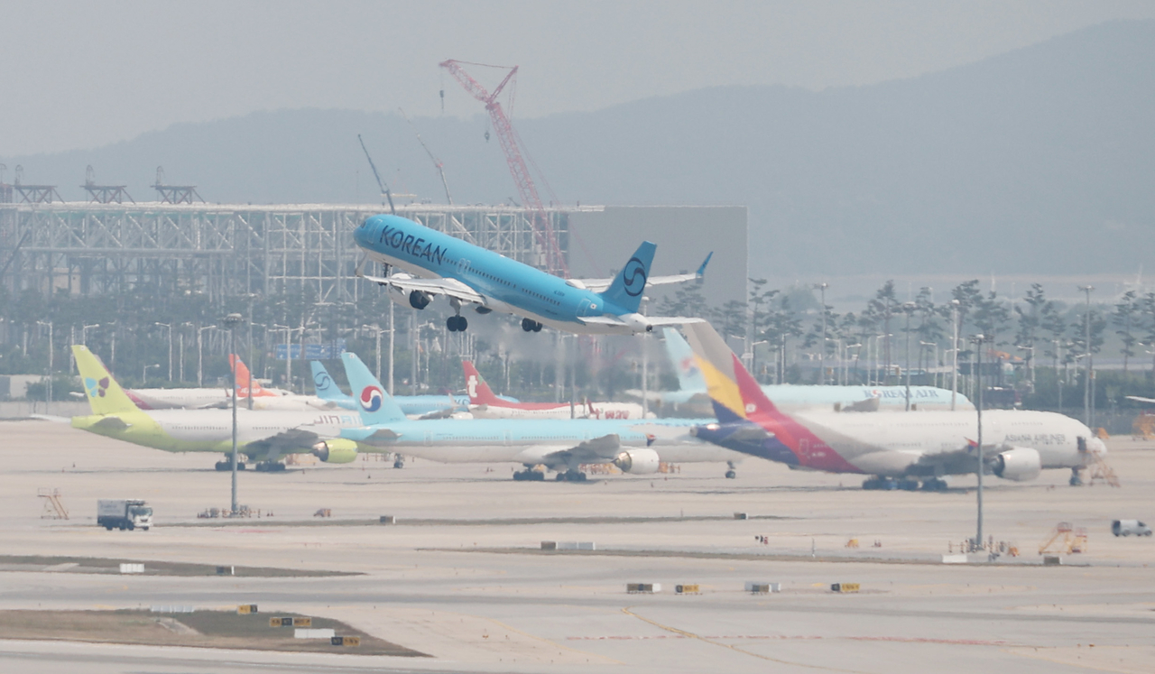 This photo, taken June 16, shows planes at Incheon International Airport in Incheon, west of Seoul. (Yonhap)