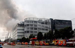 Firefighters race to keep Coupang blaze from battery-filled floor