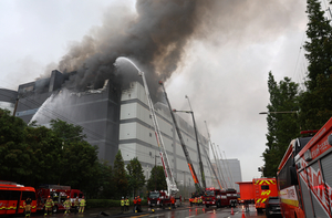 Despite rain, Coupang warehouse blaze burns into third day