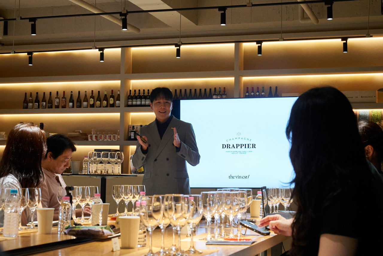 Sommelier Joo Jae-min introduces French champagne house Drappier at CSR Table in Gangnam-gu, Seoul. [Photo provided by CSR Wine]