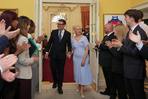 New UK PM Burnham stamps authority with cabinet shake-up