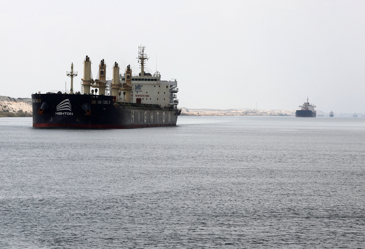 Ships move through the Suez Canal, in Ismalia, Egypt, July 31, 2025.   Reuters-Yonhap