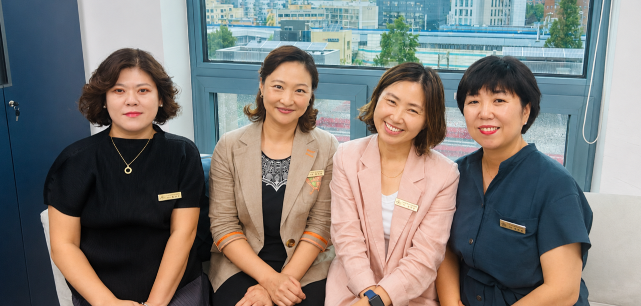 Hong Bo-ra, education vice president; Lee Ji-young, fiscal vice president; Lee Hee-sun, president of the Seoul Metropolitan Family Childcare Center Association; and Jeong Yeon-sun, policy vice president (from left) spoke in an interview Tuesday about the importance of infant care, the role of family childcare centers in Seoul, and ways to improve the childcare environment. Provided by the Seoul Metropolitan Family Childcare Center Association
