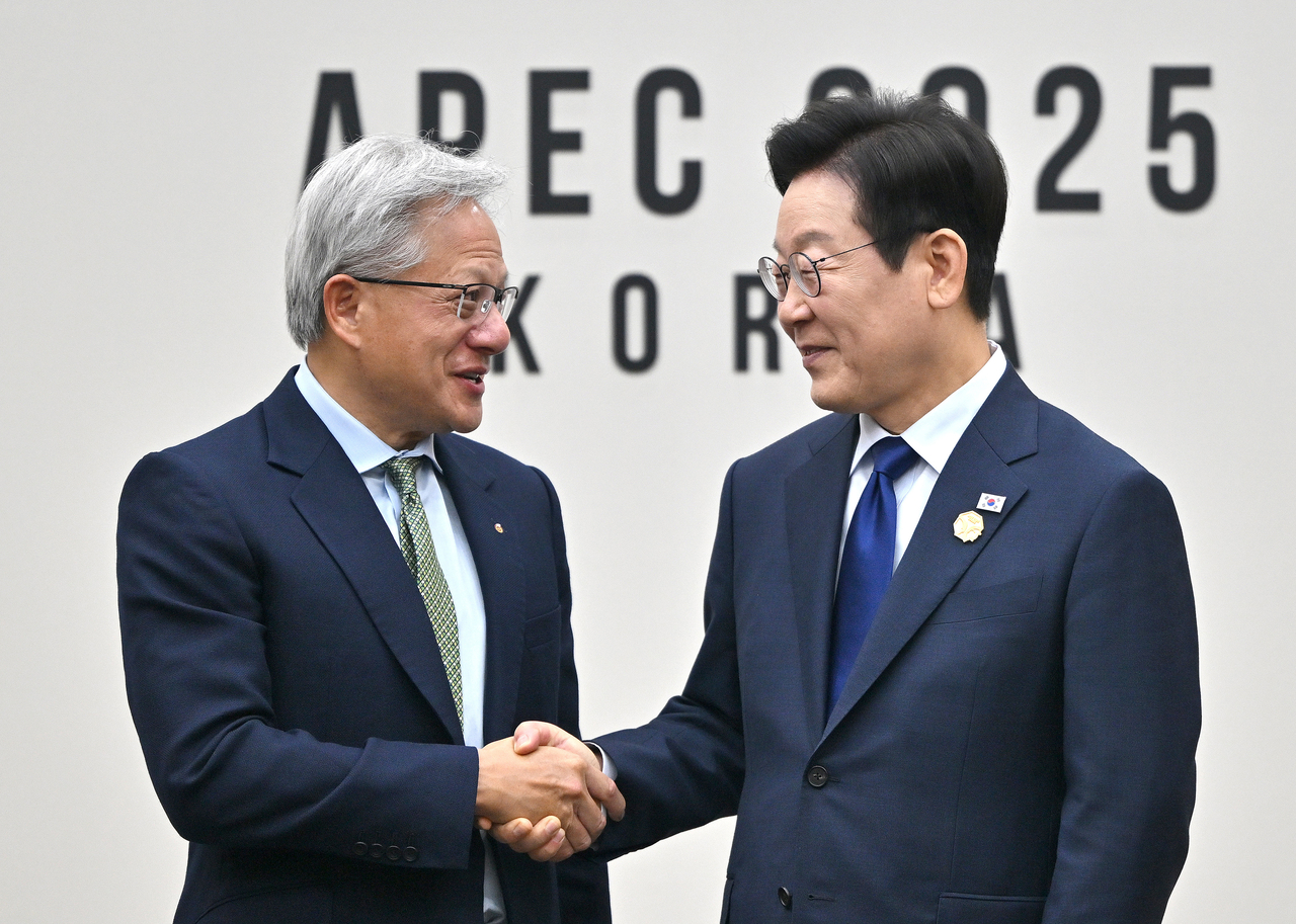 South Korean President Lee Jae Myung (right) shakes hands with Nvidia
founder and CEO Jensen Huang  during their meeting on the sidelines of the Asia-Pacific Economic Cooperation (APEC) summit in Gyeongju on October 31, 2025 in Gyeongju, South Korea. (Getty Images)