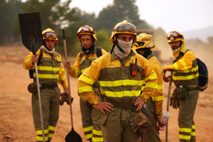 Firefighters battle one of Spain's biggest-ever wildfires during heat wave across the Mediterranean