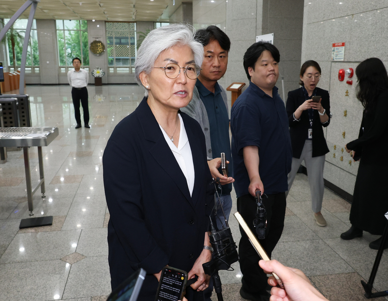 South Korean Ambassador to the United States Kang Kyung-wha answers reporters’ questions as she enters the Seoul Government Complex in Jongno-gu, Seoul, on July 15 for a meeting with Foreign Minister Cho Hyun. (Yonhap)