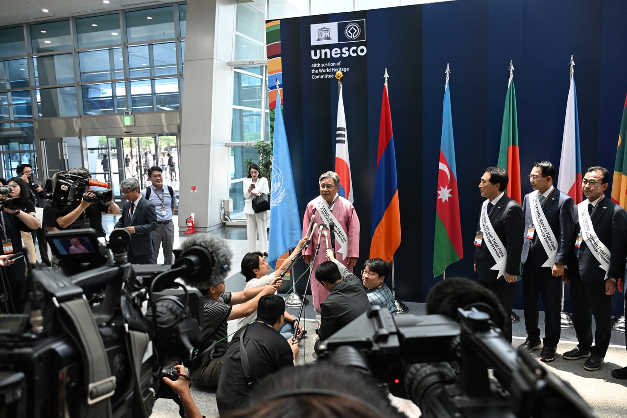 Huh Min, administrator of the Korea Heritage Service, speaks after the UNESCO committee approved a major expansion to Korea’s "Getbol, Korean Tidal Flats (Phase II)" World Heritage site at Bexco in Busan, Saturday. (Korea Heritage Service)