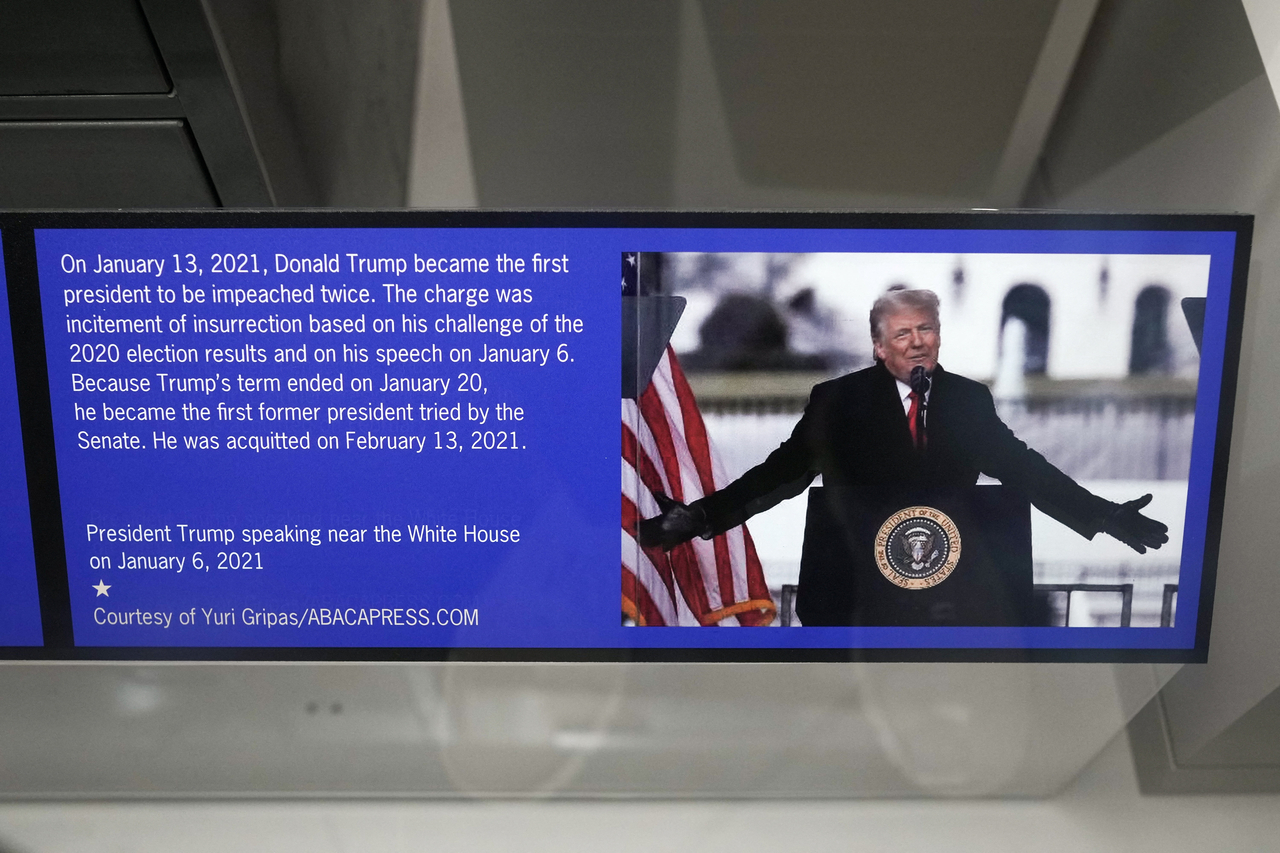 A display of a photo of US President Donald Trump related to his second impeachment at the Smithsonian National Museum of American History, in Washington, Saturday     (Reuters-Yonhap)