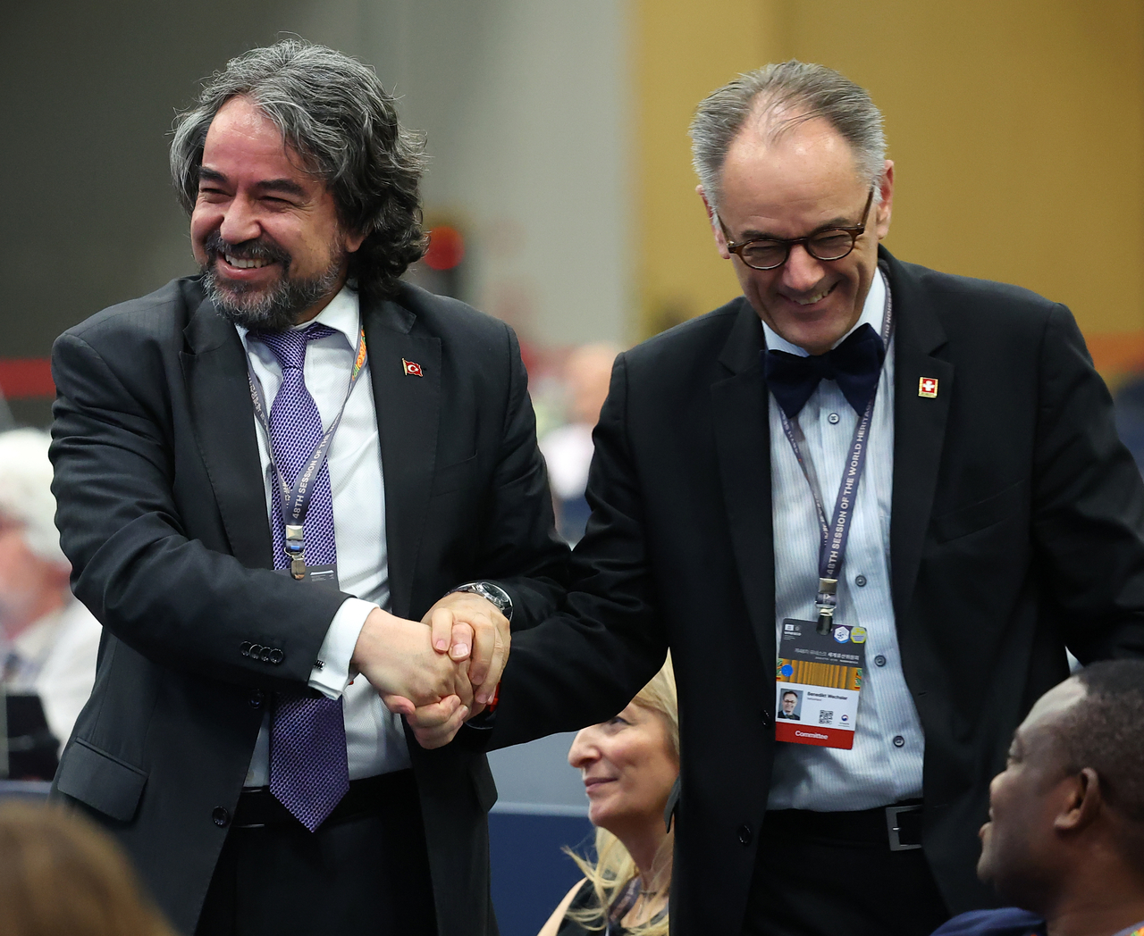 Members of the Turkish delegation (left) receive congratulations after Turkey was selected to host the next session of the UNESCO World Heritage Committee during the committee's 48th session at BEXCO in Busan on Monday. (Yonhap)