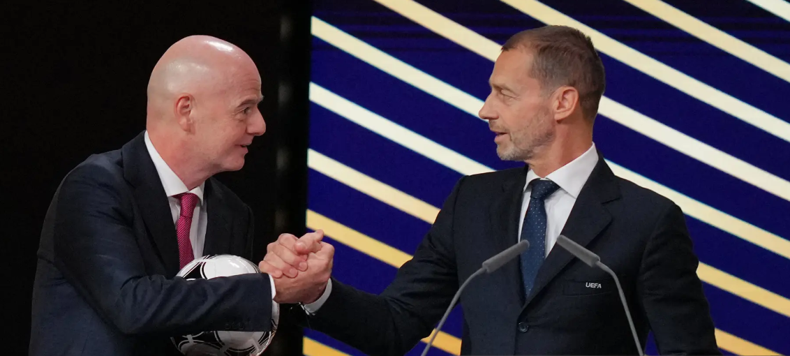 FIFA President Gianni Infantino (left) meets with UEFA President Aleksander Ceferin, at the 50th UEFA Congress in Brussels, Feb. 12.   (AFP-Yonhap)