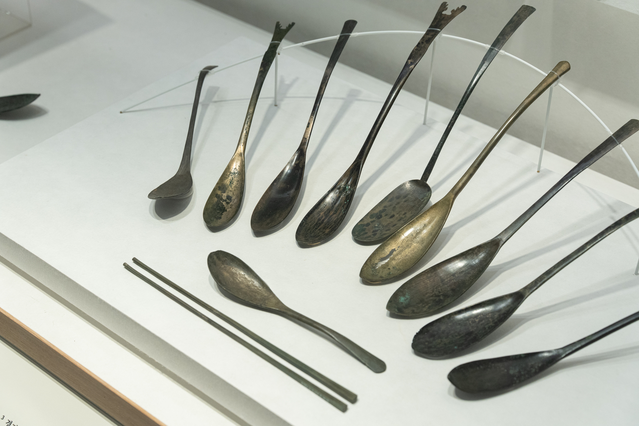 Metal spoons inscribed with "Cheongye Samnyeon," referring to 1623 during the Joseon era, are shown at the National Museum of Korea in Seoul. (NMK)