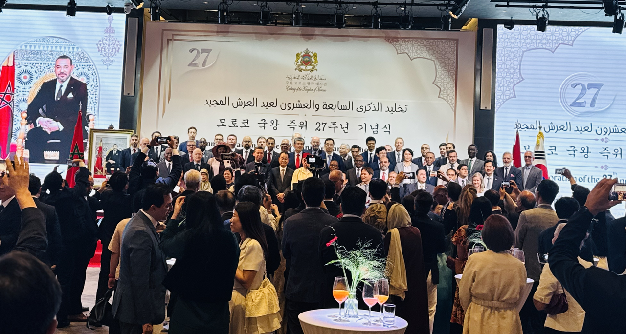 Members of the diplomatic corps and other distinguished guests pose for a group photo during Morocco's Throne Day reception in Seoul on Thursday. (Sanjay Kumar/The Korea Herald)