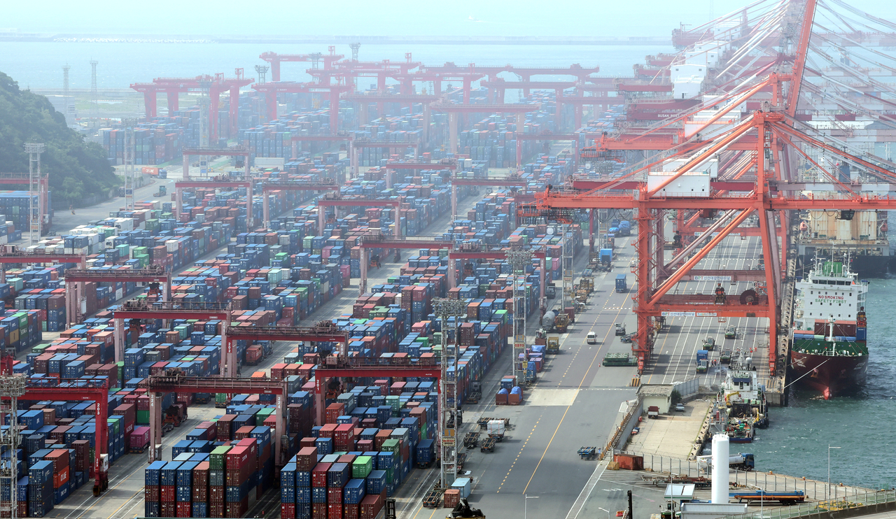 Containers are stacked at Sinseondae Pier in Busan Port. [Yonhap]