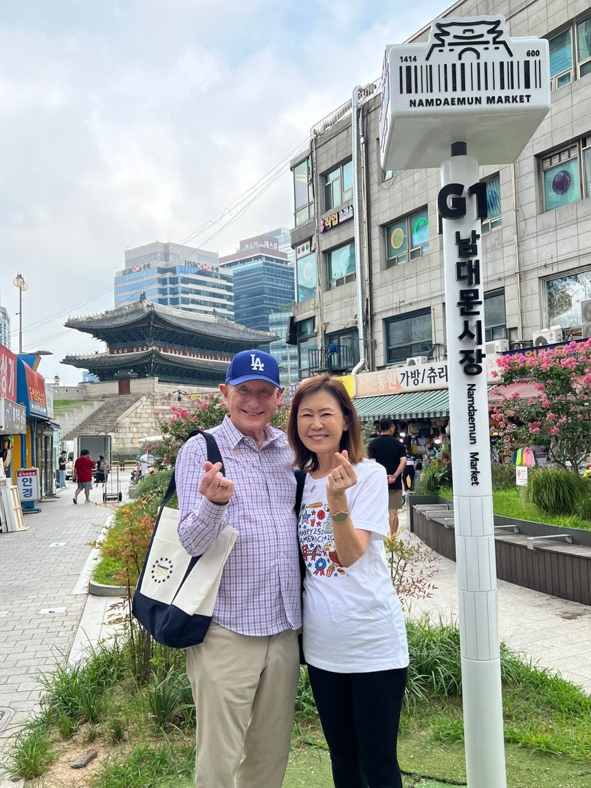 US Ambassador to South Korea Michelle Steel (right) poses with her husband, attorney Shawn Steel, at Namdaemun Market, central Seoul, in this photo uploaded to her X account on Saturday. (Screenshot from Steel's X account)