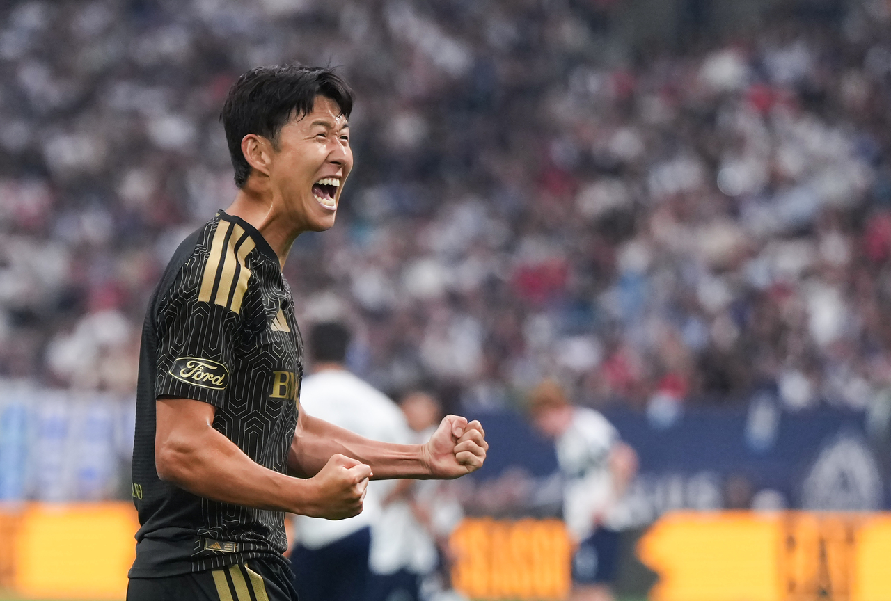Son Heung-min reacts after scoring a goal against Vancouver Whitecaps FC, in Vancouver, Saturday.    (Yonhap)