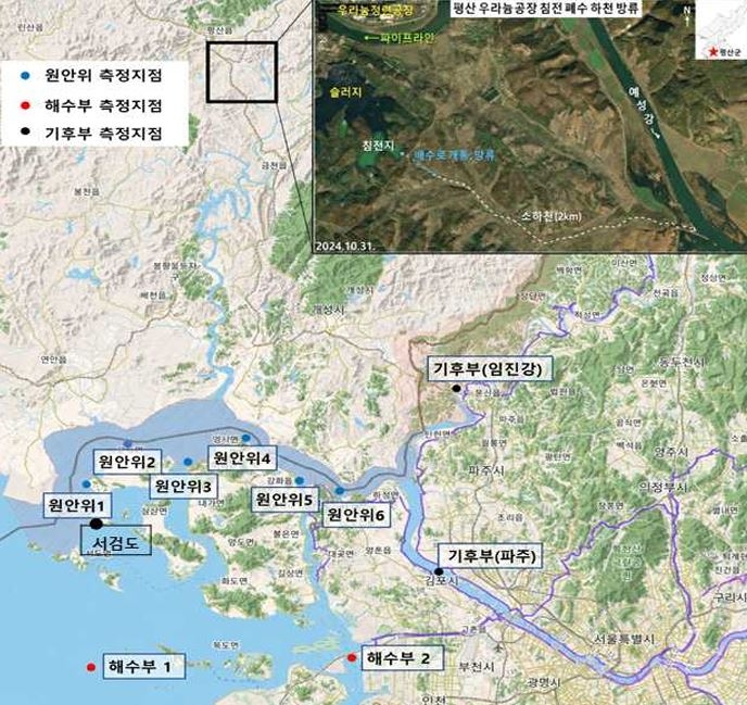 This image from a government press release shows uranium testing sites near the inter-Korean border. Blue dots mark sites tested by the Nuclear Safety and Security Commission, red dots mark those tested by the Ministry of Oceans and Fisheries, and black dots indicate those tested by the Ministry of Climate, Energy and Environment. (Government of South Korea)