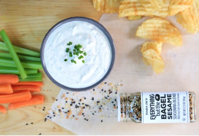Trader Joe’s Everything But the Bagel Sesame Seasoning Blend is shown with chips and vegetables in an image from the company’s website. (Trader Joe’s website)