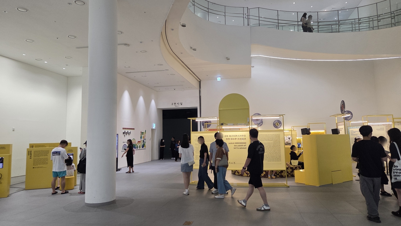 Visitors tour an exhibition at the Ulsan Museum of Art on Saturday. (Yonhap)