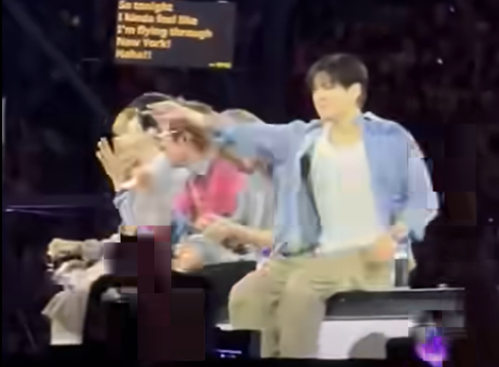 BTS' Jungkook makes a Spider-Man web-slinging hand gesture during a concert in New Jersey on Saturday. (Screenshot from social media)
