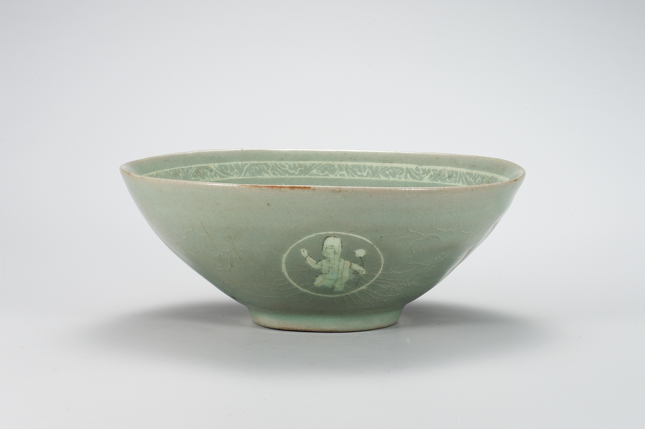 Celadon Bowl with Inlaid Grape and Child Design