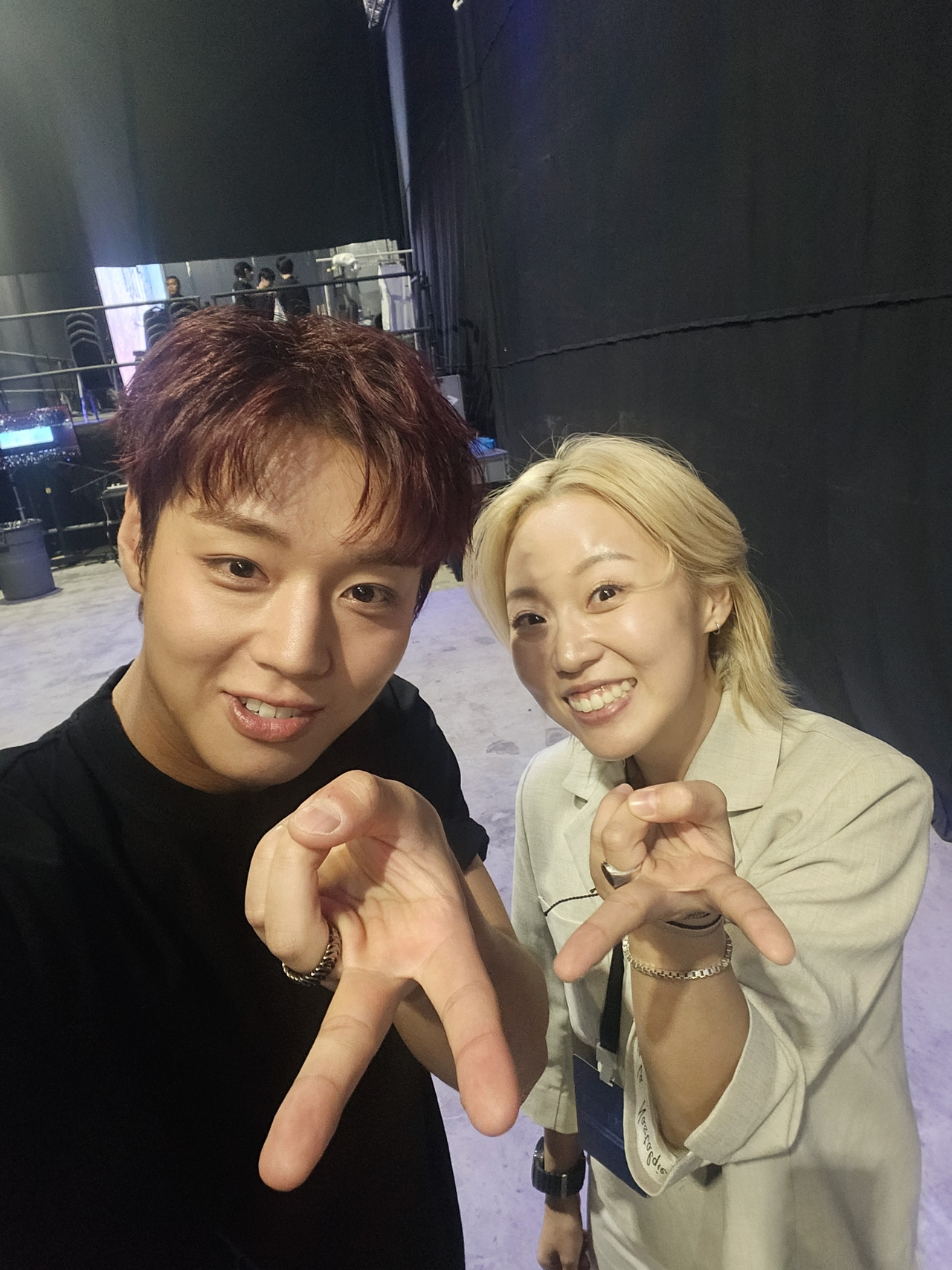 April Kim poses with actor Park Ji-hoon after serving as the MC for his fan meeting in Singapore on July 18. (Courtesy of April Kim)
