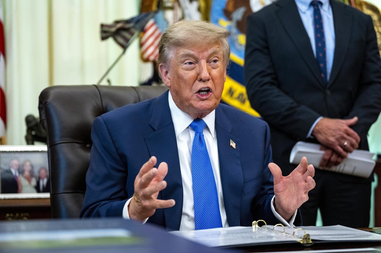 US President Donald Trump speaks during the signing of an executive order at the White House in Washington on Monday, in this photo released by EPA. (Pool photo via Yonhap)